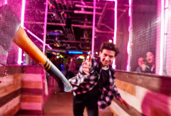 Axe throwing at boom battle bar