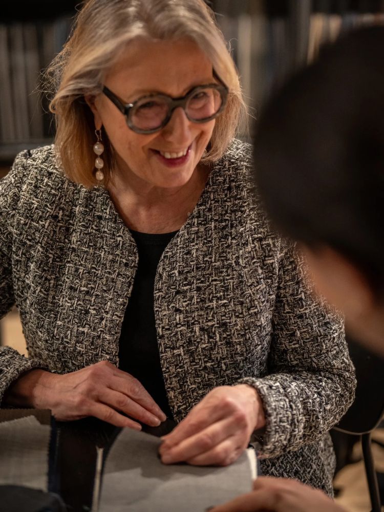 woman having a consultation at a savile row design studio in london