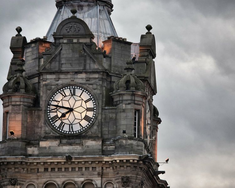 a clock tower in edinburgh seen on a sherlock holmes experience ay in edinburgh