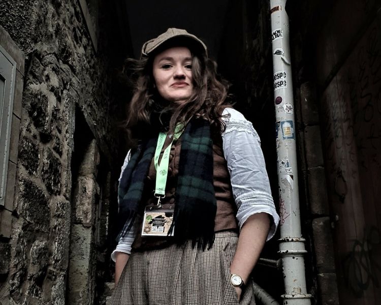 tour guide dressed up as sherlock holmes on a sherlock holmes experience day in edinburgh