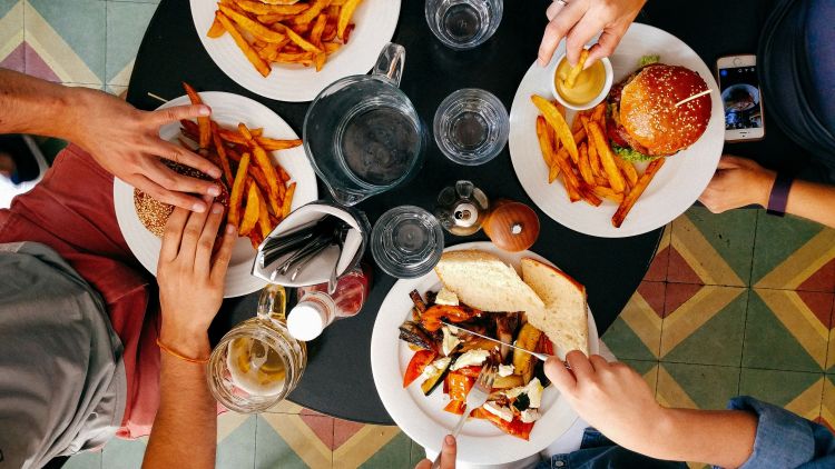 Looking down at people eating out