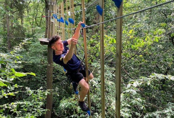 Man on the go ape challenge plus course