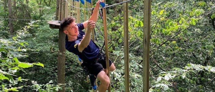 Man on the go ape challenge plus course