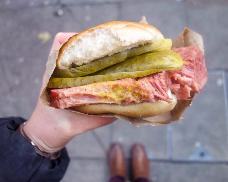 meat and pickle bap enjoyed on a london street art and food taste of diversity tour