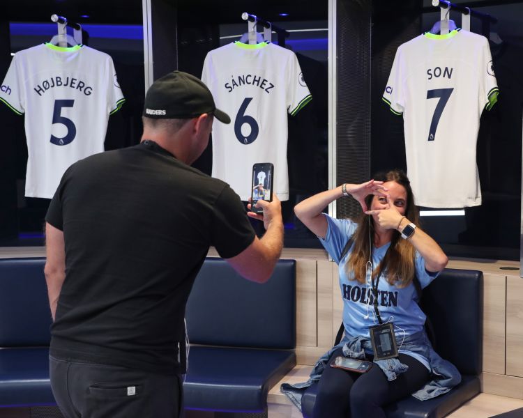 visitors in the home dressing room on the tottenham hotspur stadium tour in london