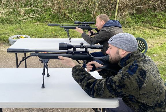 2 people on an air rifle shooting experience with rapid airgun training