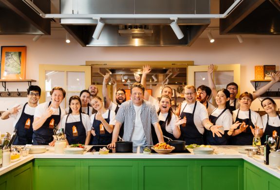 students and jamie oliver at the jamie oliver cookery school