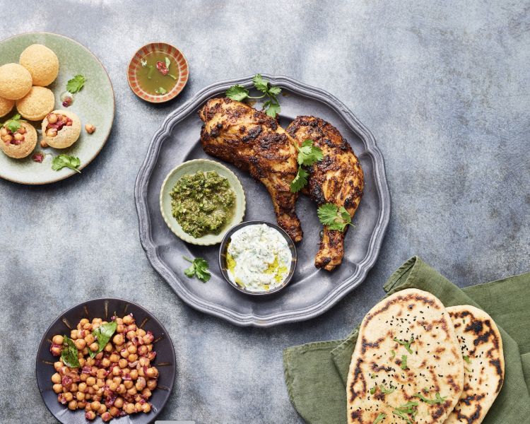 plates of indian street food made at jamie oliver cookery school in london