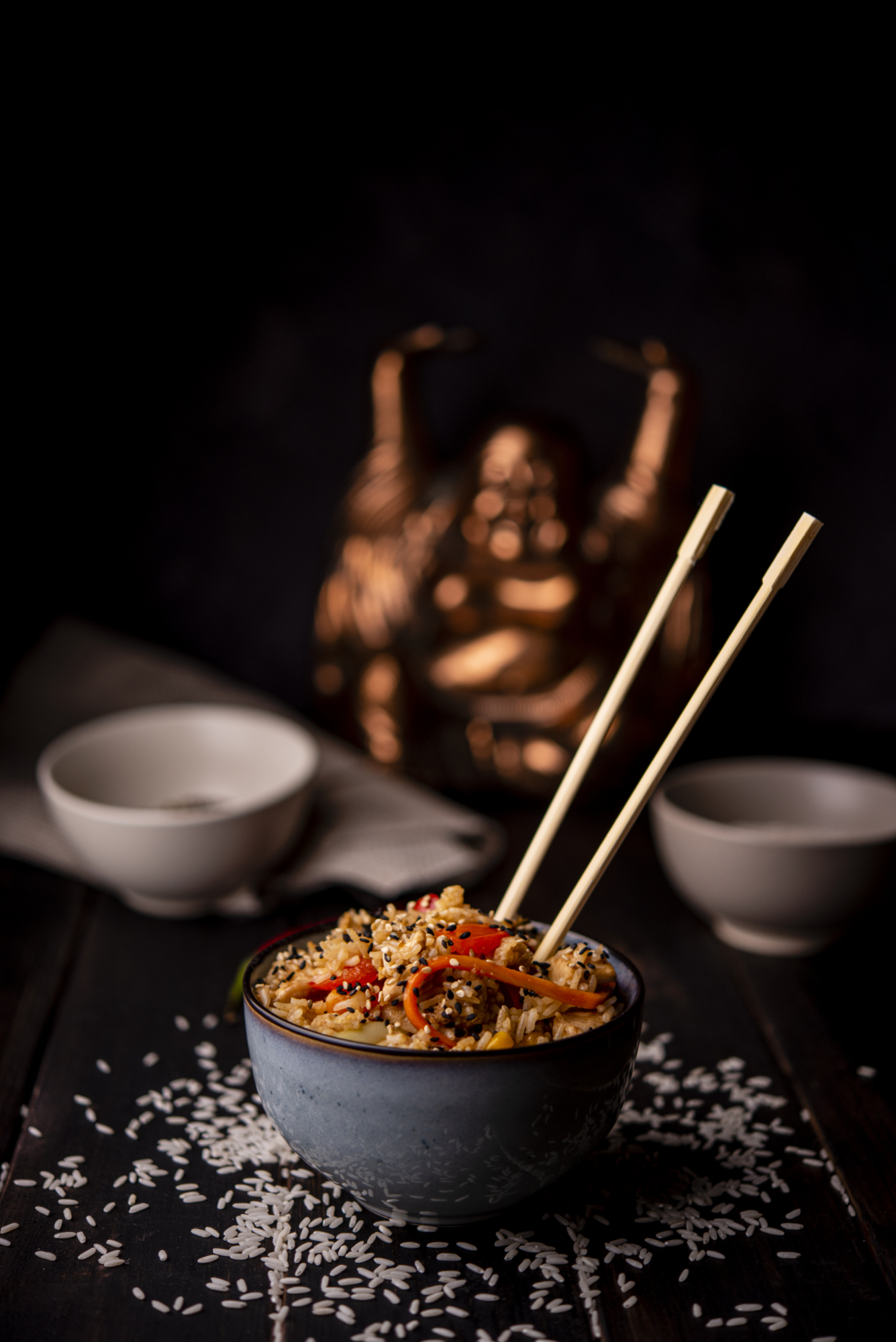 Bowl asian food with rice chopsticks