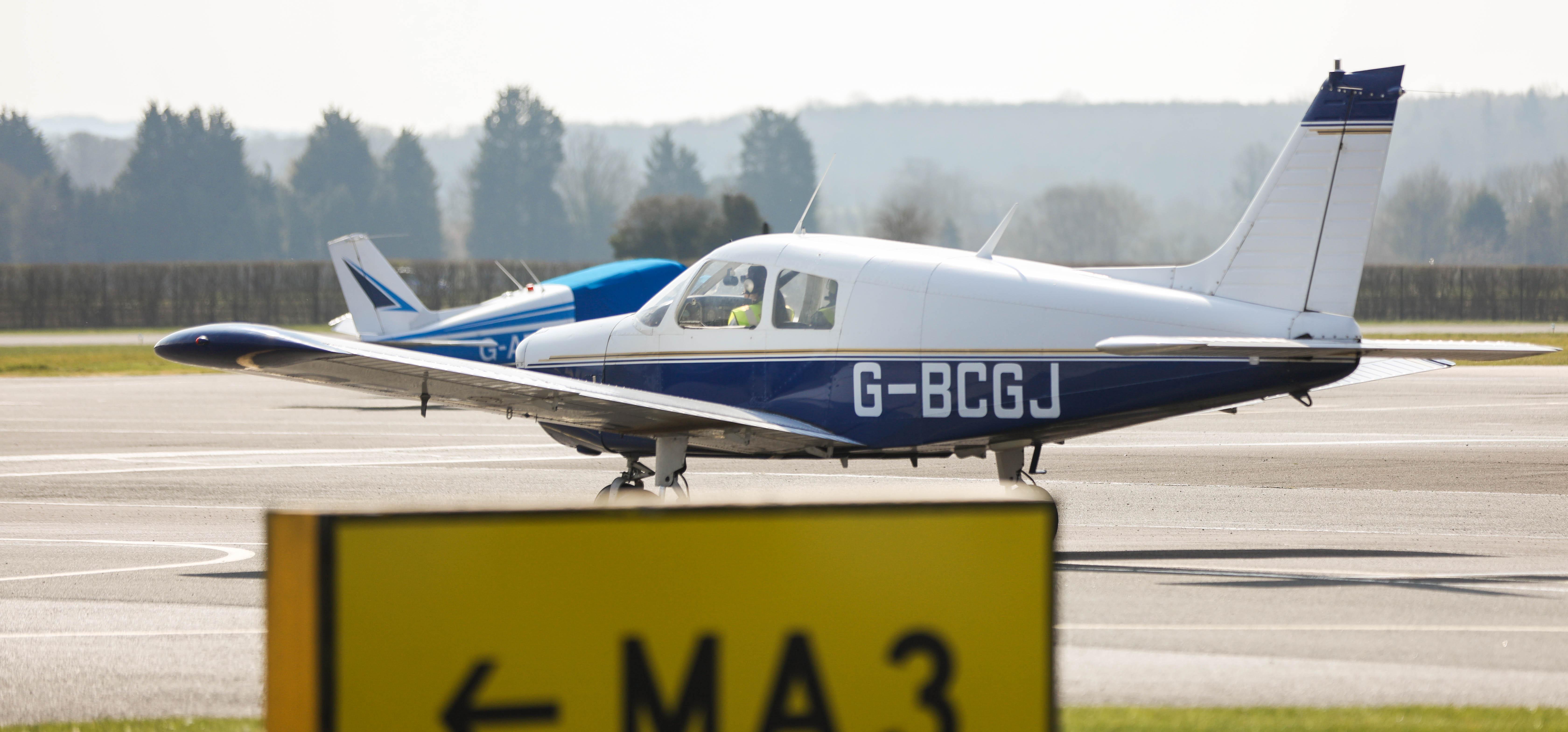 a small aeroplane on a runway for a plane flying lesson experience