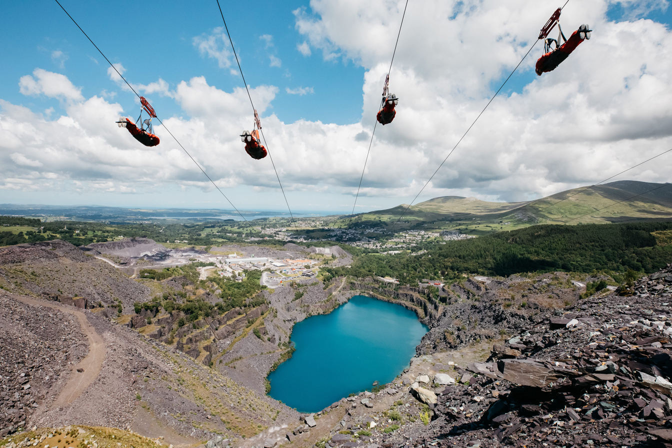 four zip lines over a disused quarry for the velocity zip line experience from zip world