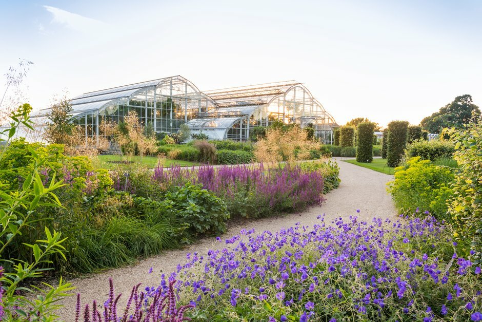 a view of the glasshouse at rhs wisley